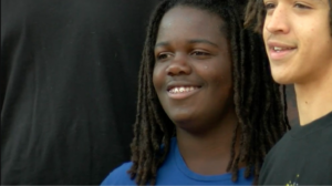 Black High School Student Leaving School After Being Told to Cut His Locs