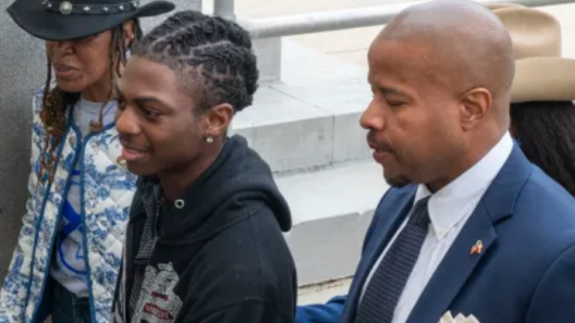 Darryl George, suspended over locs heads to court in Anahuac Texas with his attorney.