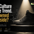 Editorial image of an unbranded high-top sneaker under a spotlight with Black urban culture, financial charts, and global market graphics representing how Black consumer influence creates brand value. Description: Feature image for a BlackEconomicDevelopment.com story about Larry Miller’s comments on young Black urban consumers, Air Jordans, sneaker culture, brand equity, and who captures the economic upside.