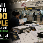 Liberian immigration officials process documents at an airport in Monrovia as Liberia prepares to accept up to 1,200 third-country deportees from the United States.